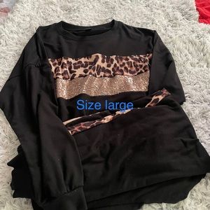 Womens 2 piece set . Leopard print size large . Very comfy and well made .